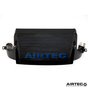 AIRTEC Motorsport intercooler upgrade installed in a Mini Cooper S F56, showing the sleek, high-performance intercooler fitted in the engine bay.