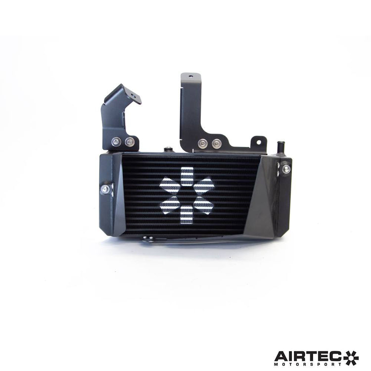 AIRTEC Motorsport gearbox oil cooler for Toyota Yaris GR Gen 2 automatic transmission, featuring durable metal fins and mounting brackets.