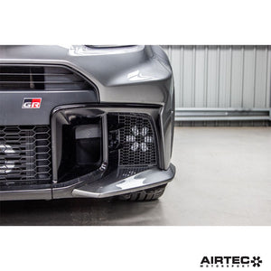 AIRTEC Motorsport gearbox oil cooler installed in a Toyota Yaris GR Gen 2, showcasing the compact aluminum cooling unit.
