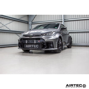 AIRTEC Motorsport Gearbox Oil Cooler installed in a Toyota Yaris GR Gen 2 automatic transmission, showing the cooler and fittings.