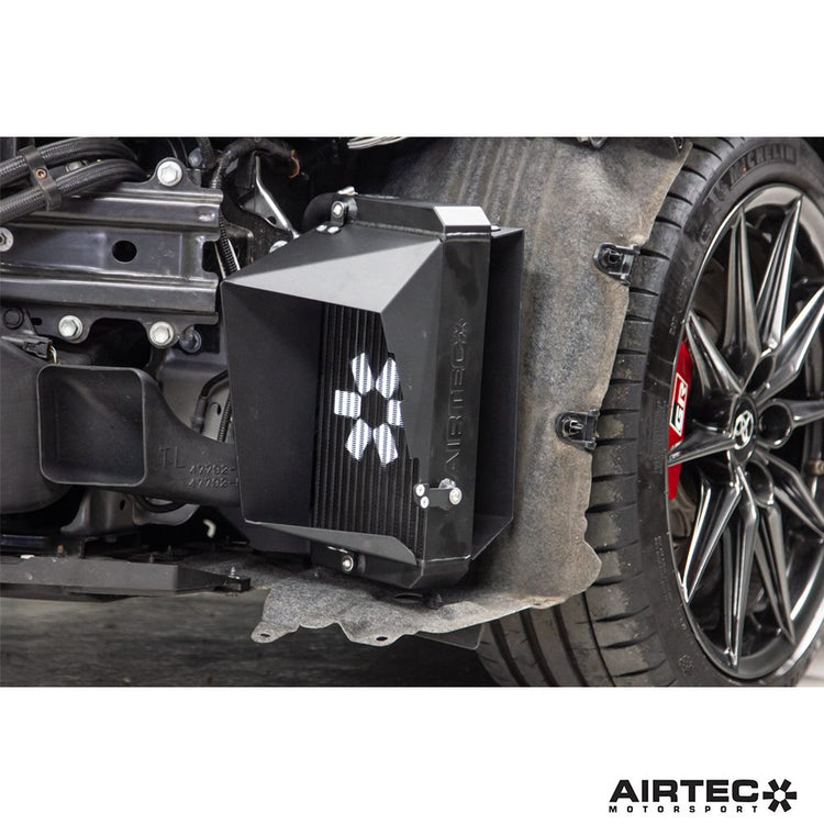 AIRTEC Motorsport gearbox oil cooler for Toyota Yaris GR Gen 2 automatic transmission, shown installed on the vehicle.