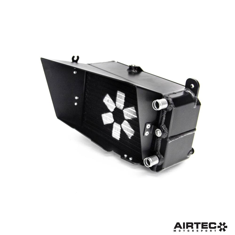 AIRTEC Motorsport auxiliary radiator for Toyota Yaris GR Gen2, shows sleek black cooling fins and mounting hardware.