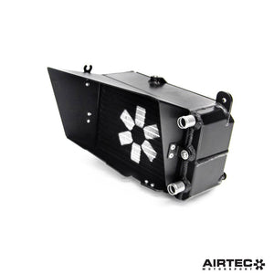 AIRTEC Motorsport auxiliary radiator for Toyota Yaris GR Gen2, shows sleek black cooling fins and mounting hardware.