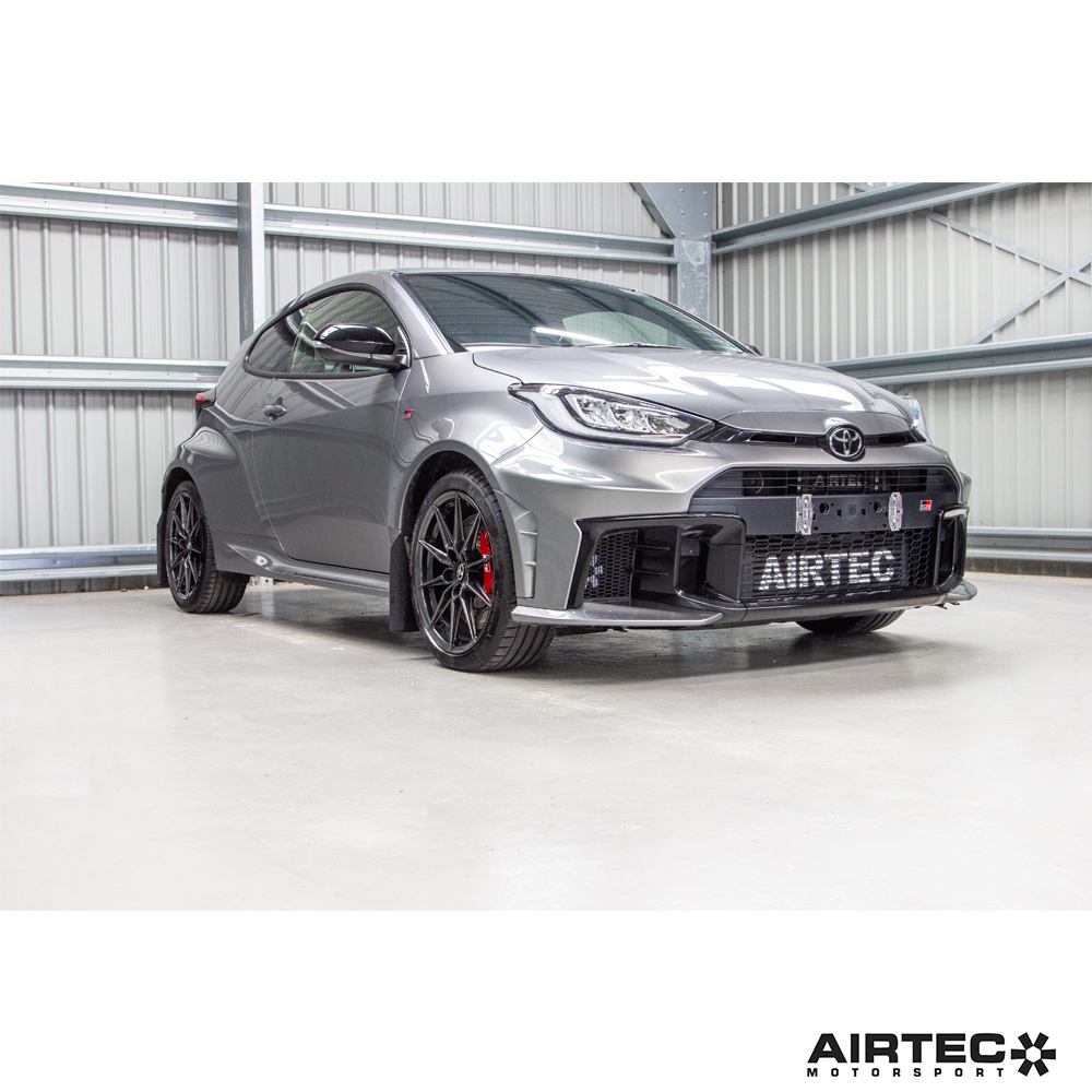 AIRTEC Motorsport auxiliary radiator installed in a Toyota Yaris GR Gen2, showcasing the performance cooling component.