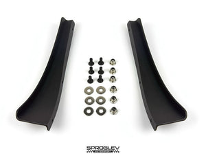 Sprogley Motorsport front bumper canards for F87 BMW M2, aerodynamic body styling components on a car front.