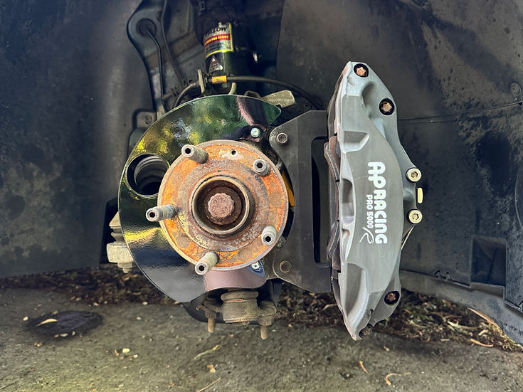 Sprogley Motorsport brake cooling kit for MQB and MQB EVO lower control arms, featuring cooling ducts and hardware.