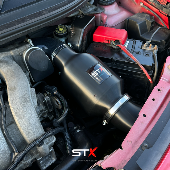 SprogTech STX K4M enclosed intake kit for Twingo RS by Sprogley Motorsport, shown installed on the vehicle.