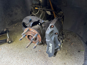 Sprogley Motorsport brake cooling kit for MQB and MQB EVO lower control arms, featuring cooling ducts and hardware for enhanced brake performance.