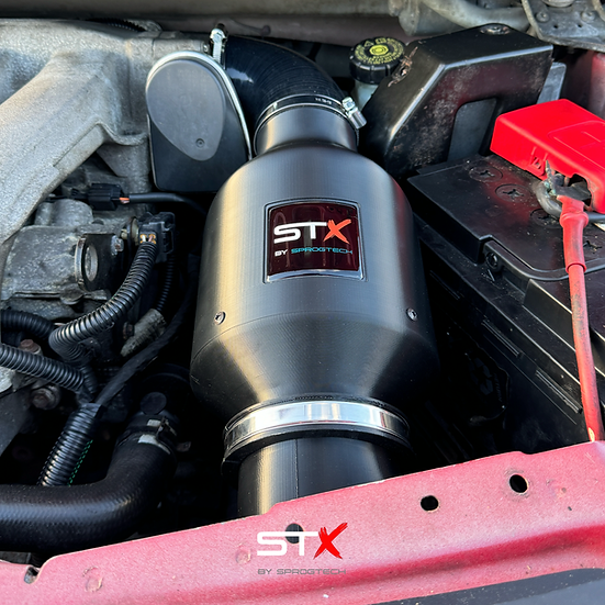 SprogTech STX K4M enclosed intake kit for Twingo RS, showcasing the sleek body and installation components by Sprogley Motorsport.