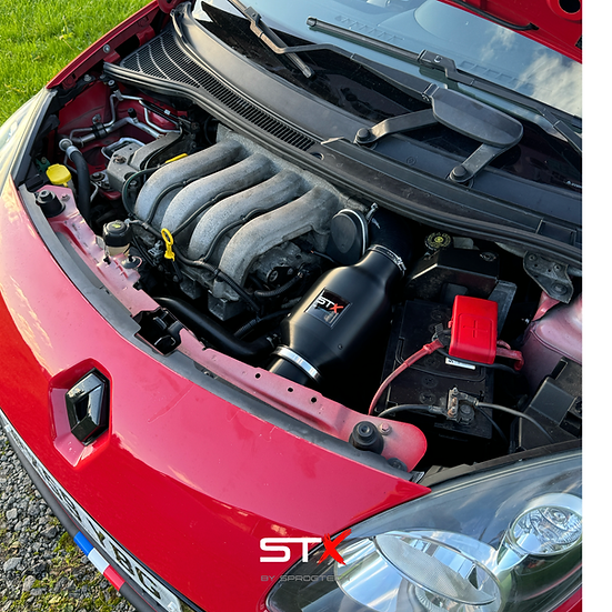 SprogTech STX K4M enclosed intake kit for Twingo RS, black body and piping, with branded air filter and mounting components.