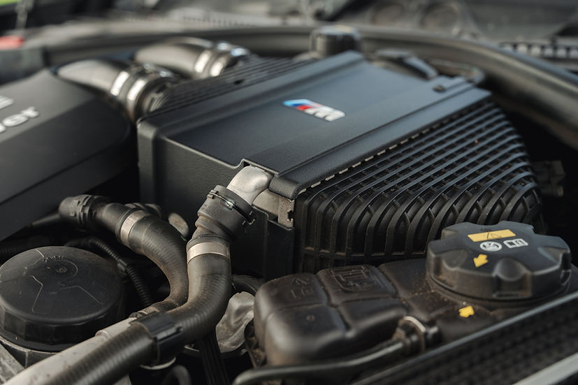 Sprogley Motorsport S55 Charge Cooler Cover for body and styling, showcasing sleek design on a vehicle engine bay.