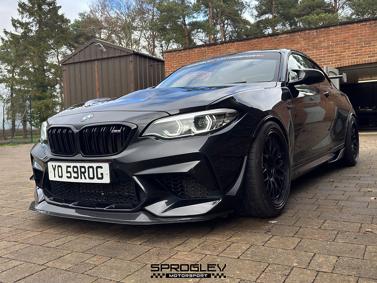 Sprogley Motorsport front bumper canards for F87 BMW M2, aerodynamic body styling accessories attached to the front bumper.