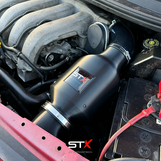 SprogTech STX K4M enclosed intake kit installed in a Twingo RS, showing the sleek body and styling components by Sprogley Motorsport.
