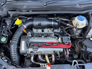 SprogTech ST-X AVY Cup enclosed intake kit for VW Lupo 1.6 GTI, showing the black body and mounting components.
