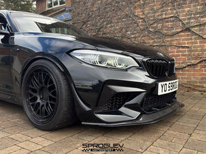 Sprogley Motorsport front bumper canards for BMW M2 F87, aerodynamic body styling parts with sleek design details.