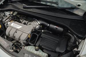 SprogTech STX F4R enclosed intake kit installed on a Clio RS197 and RS200, showcasing the sleek body and styling upgrade from Sprogley Motorsport.