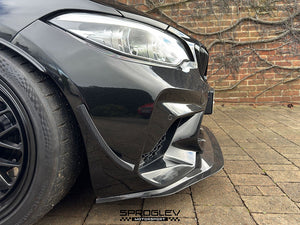 Sprogley Motorsport front bumper canards on a BMW M2 F87, enhancing aerodynamic styling and aggressive front-end look.