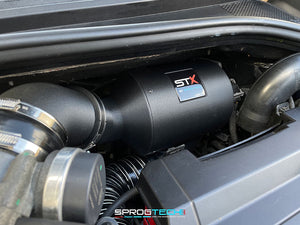 SprogTech STX F4R enclosed intake kit installed on a Clio RS197 and RS200, showcasing the body and styling upgrade by Sprogley Motorsport.