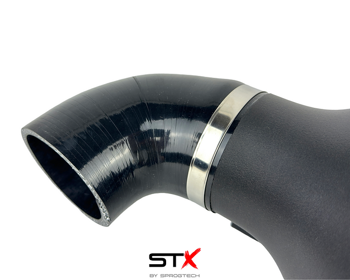 SprogTech STX K4M enclosed intake kit for Twingo RS by Sprogley Motorsport, featuring sleek black body and air intake components.