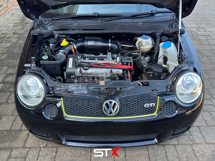SprogTech STX AVY V2 enclosed intake kit for VW Lupo 1.4, 1.4S, 1.6 GTI, showing the black intake components and branding