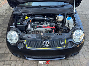 SprogTech STX AVY V2 enclosed intake kit for VW Lupo 1.4, 1.4S, 1.6 GTI, showing the black intake components and branding