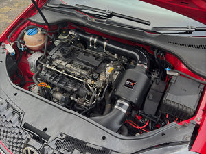 SprogTech STX EA3 enclosed intake kit for 2.0 TFSI engine, including air filter and intake tubing, by Sprogley Motorsport.
