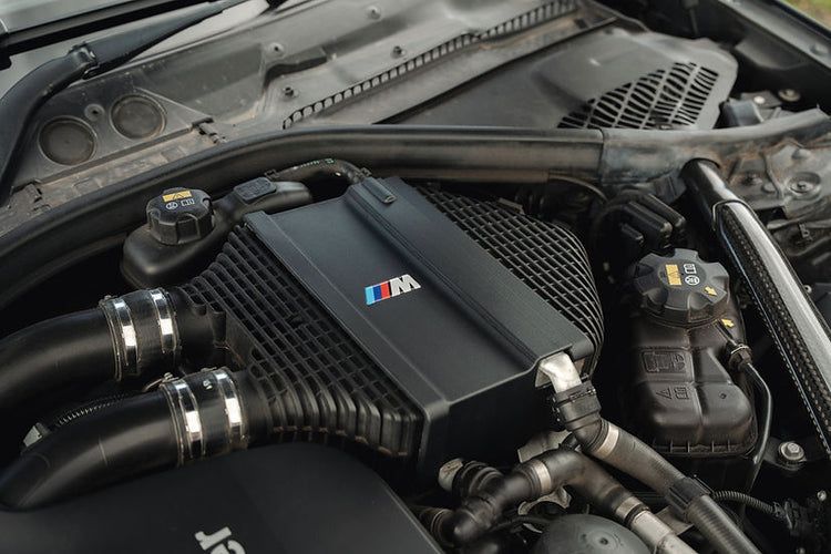 Sprogley Motorsport S55 Charge Cooler Cover, automotive body styling part, with black finish and detailed branding on the cooler cover.