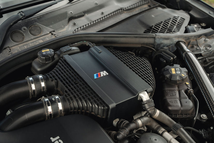 Sprogley Motorsport S55 Charge Cooler Cover, automotive body styling part, with black finish and detailed branding on the cooler cover.